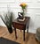 Beautiful antique Italian solid walnut side table or console with four beautiful walnut carved legs, detailed by the...