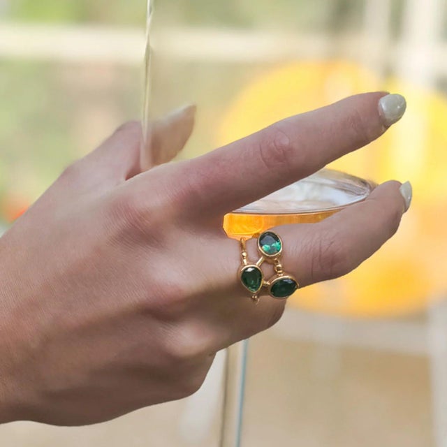 Unveil your inner queen with the Cleopatra Jade & Gold Adjustable Ring, a masterpiece of elegance and power. This...