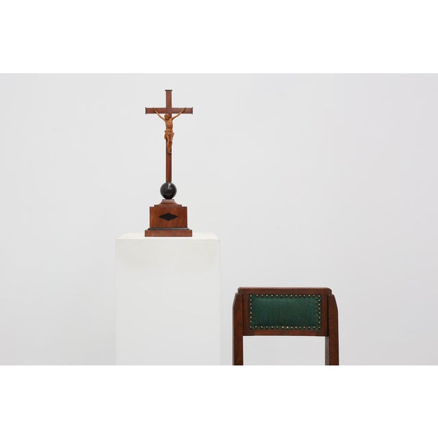 A striking Belgian table crucifix dating from the early 20th century, combining devotional significance with refined...
