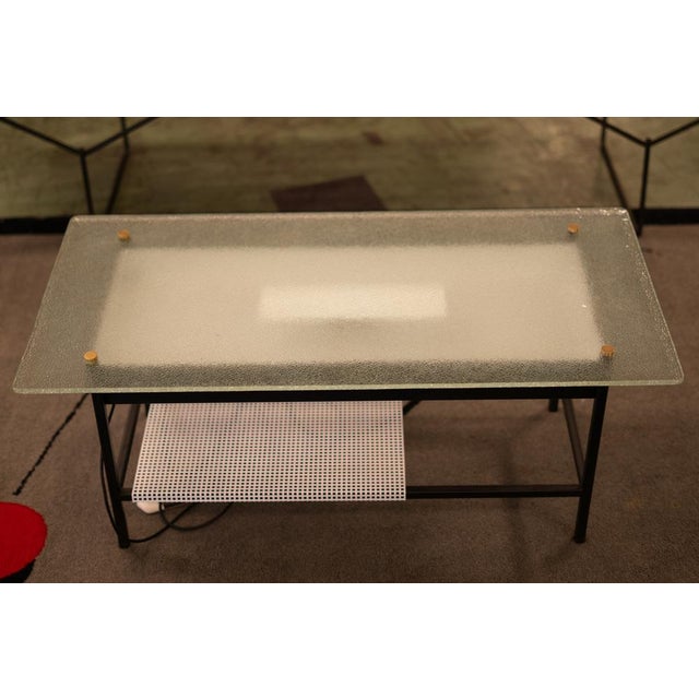 Vintage 517 Illuminated Coffee Table by R. Mathieu, 1970s, in Good conditions. Designed 1970 to 1979 This piece is...