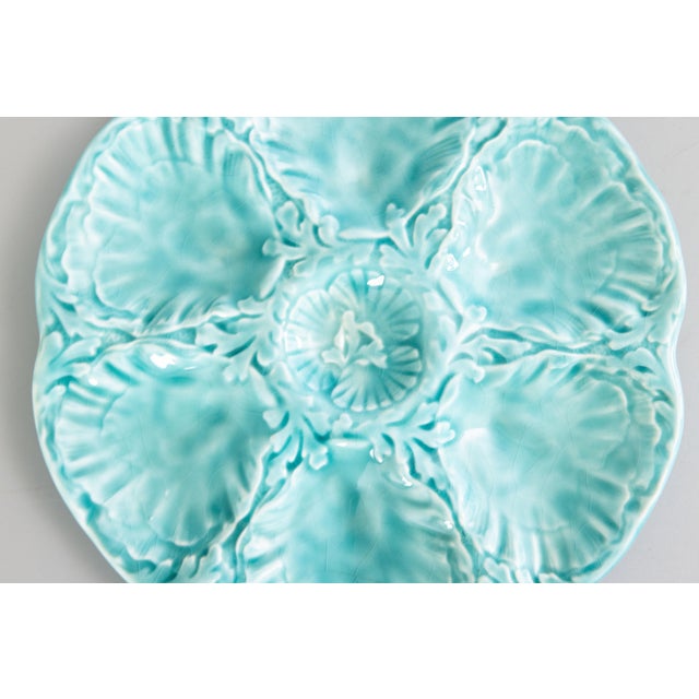 A gorgeous Mid-Century French Gien turquoise aqua blue-green glazed oyster plate, fluted at the edges. Area of the Loire...