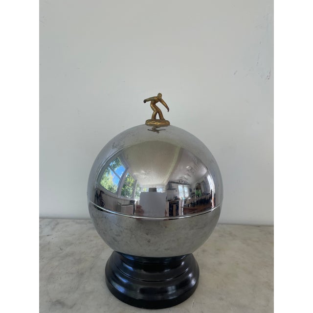A truly unique Mid Century Modern Bowling Ball/Liquor Dispensing Bowling Trophy. A very rare find! The top half of the...