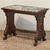 Antique Renaissance Marble Top End Table boasts a whimsical forest creature on both sides which are also lavished with...