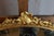 Giltwood Bérain mirror, 18th century. Good condition. DIMENSIONS: 1.10m x 0.74m