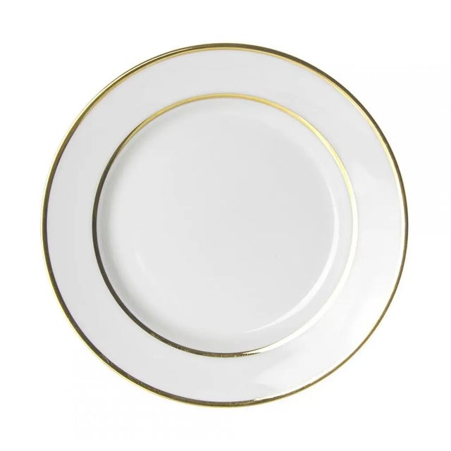 A set of 6 double gold rimmed tea plates to add to your existing tableware. This set of tea plates has 3mm gold on the...