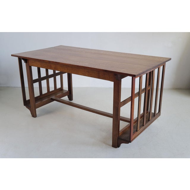 Oak plan table, Arts and Crafts 1900. Also known as an architect's table or library table, it features a large top and two...
