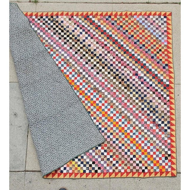 19Thc Postage stamp trip around the world with a saw tooth border quilt.The quilt is mint condition and very crisp.The...