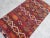 This is a vintage Turkish Anatolian kilim rug from the 1960s. The piece was hand-woven.