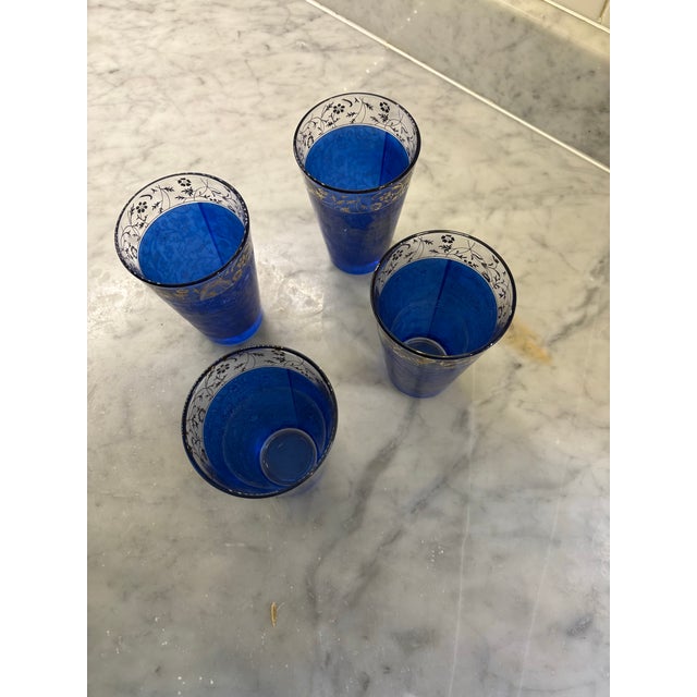 Style blends MCM with Italian design. Bohemian/Moraccan vibe. Beautiful cobalt and gold. These 4 glasses are elevated and...