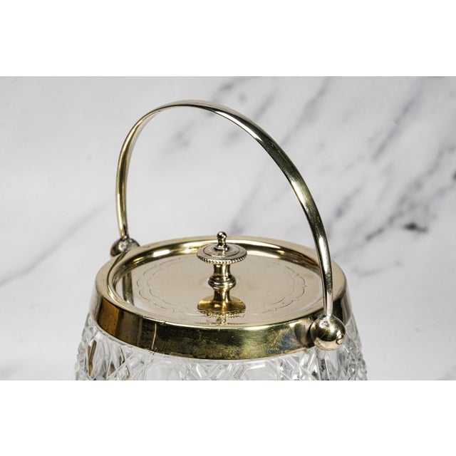 A beautiful example of early 20th-century English tableware, this circa 1920s crystal glass biscuit jar combines...