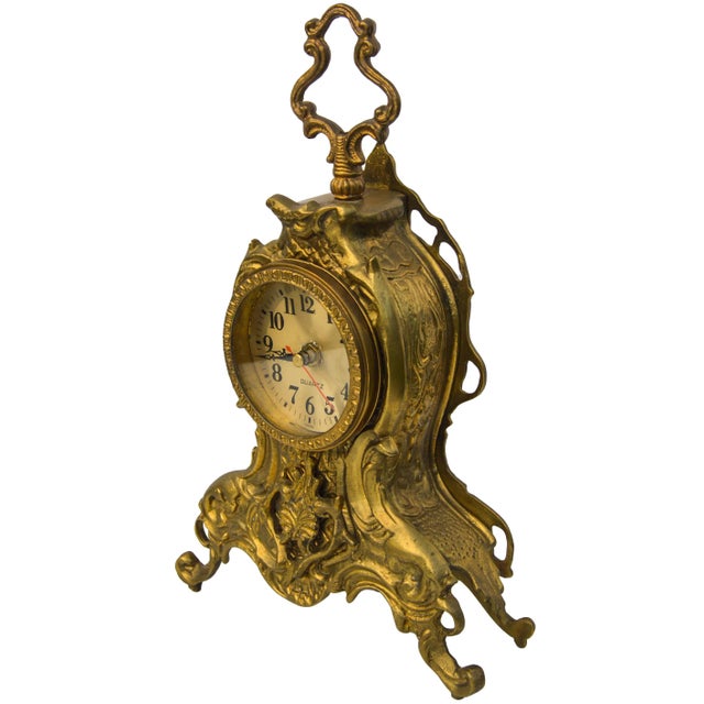 Rare antique highly crafted heavy clock constructed of solid brass. Exhibiting an intricate hand-engraved and reticulated...