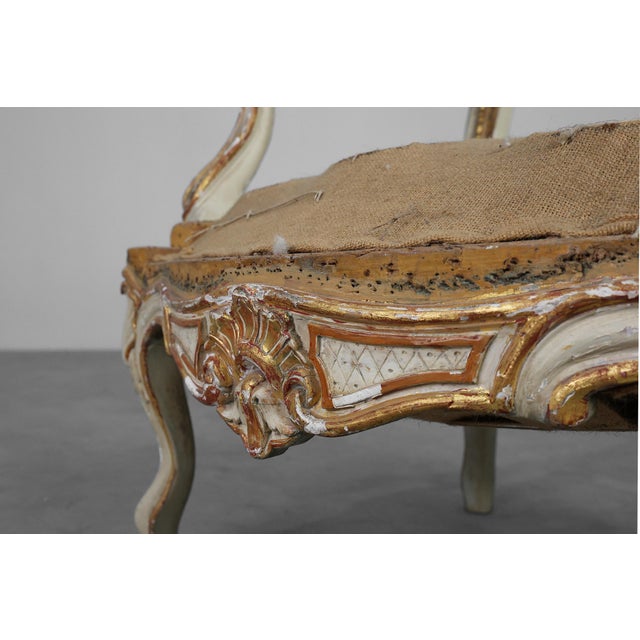 A poetic survivor of early‑19th‑century French craftsmanship, this original Louis XV armchair. It captures the elegance,...