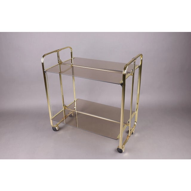 Vintage Folding Bar Cart with Smoked Glass and Gold-Colored Frame, Germany, 1980s For Sale - Image 12 of 16