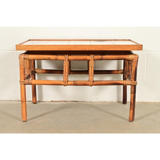 A gorgeous mid-century Hollywood Regency Organic Modern side table By John Wisner for Ficks Reed, "Far Horizons"...