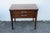This magnificent Nightstand is made of wood, walnut, and veneer. This wonderful piece is an excellent example of the Mid...