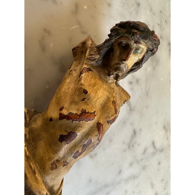 17th-Century Alpine Wooden Christ Torso with Polychrome Traces This finely carved wooden Christ torso, likely from the...