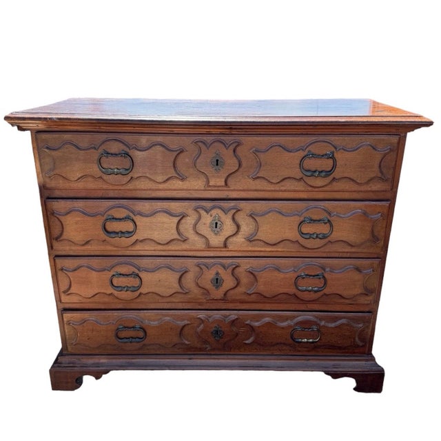 18th c Piedmont carved four drawer commode. Paneled side with bracket feet. Very clean upholstered interior. 53”l x 23”d x...