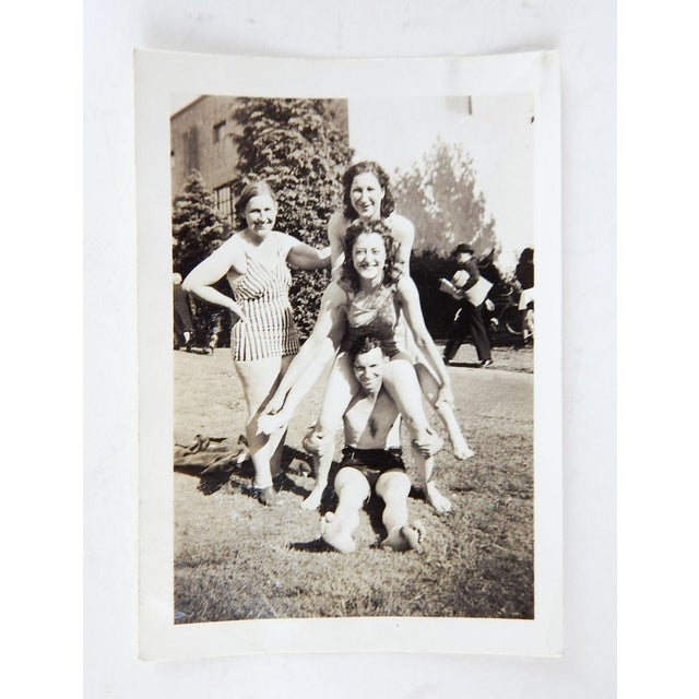 Vintage circa 1930's small vernacular snapshot photograph of women in bathing suits making a pyramid. Unframed, minor...
