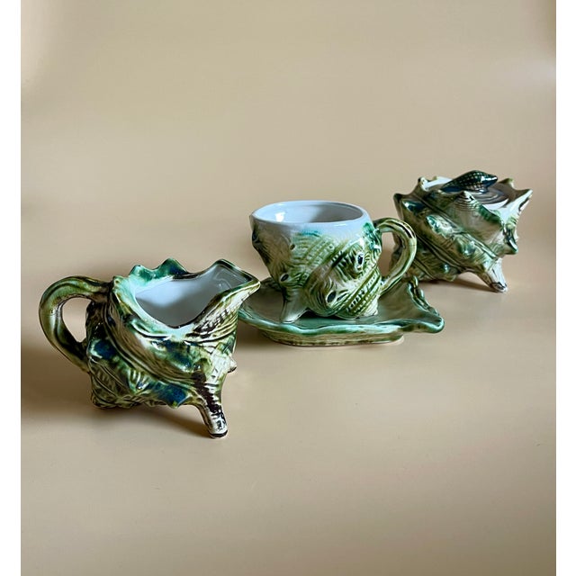 Brutalist majolica ceramic set with a shell motif, including 6 teacups and 6 saucers, 1 teapot with lid, 1 sugar bowl, and...