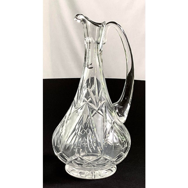 Mid century, tall, elegant, brilliant, cut glass decanter Long slender fluted neck with beautifully shaped spout Notched...