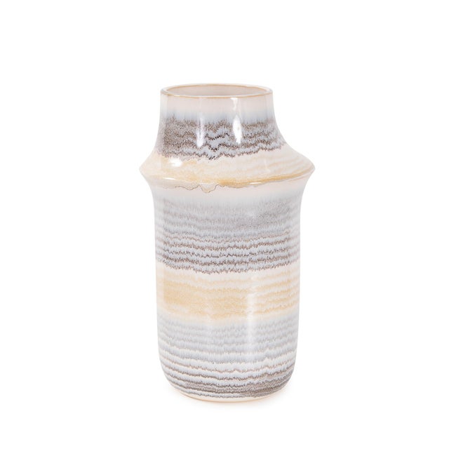 Featuring soft, layered bands of taupe, sand, and stone-gray tones, this ceramic piece captures the subtle beauty of...