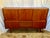 Handsome Danish teak sideboard/dry bar design by Johannes Anderson for J. slamming & Sons. See Danish sticker photo. The...