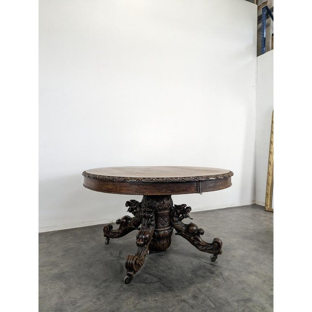 Renaissance-Style Oak Pedestal Table with Dragon Heads, in Very Good conditions.
