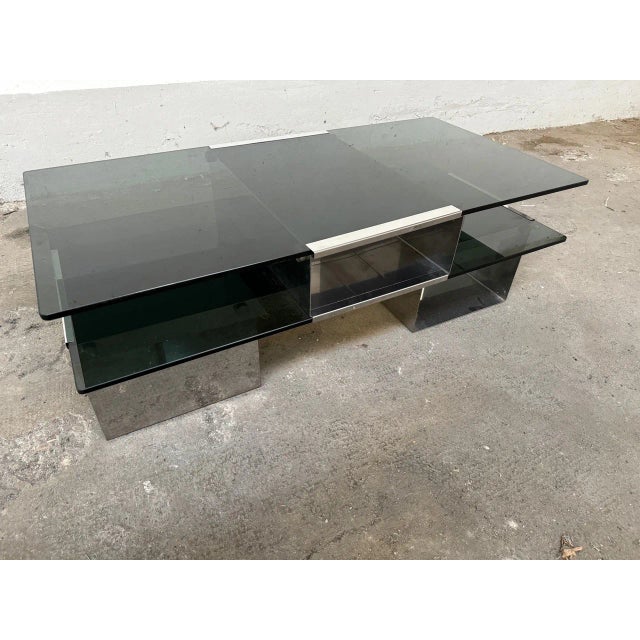 Mid-Century Modern Space Age Italian Chrome and Smoked Glass Coffee Table, 1970s, in Very Good conditions. Designed 1970...
