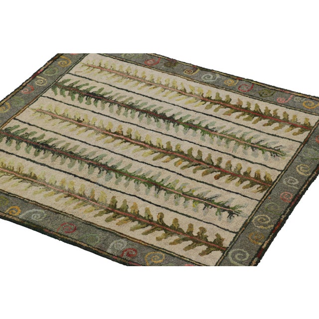 Handmade in wool and originating circa 1920-1930, this 2x3 rug is a rare and exciting new curation in Rug & Kilim’s...