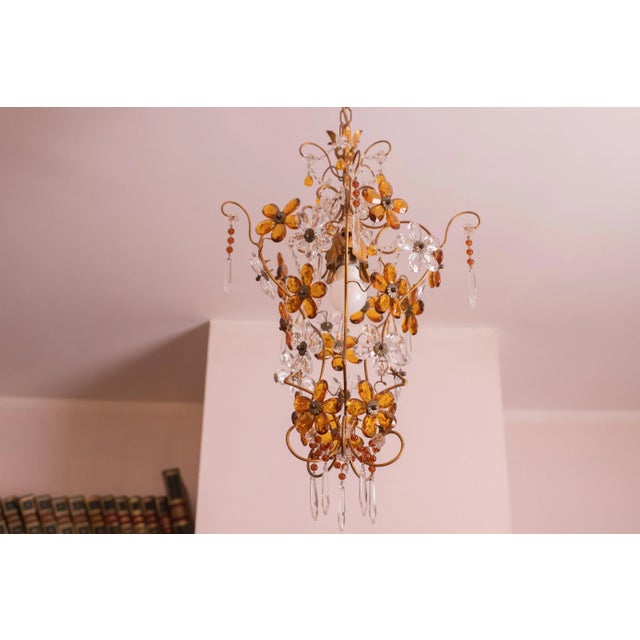 Beautiful crystal and glass chandelier full of orange and transparent flowers in perfect vintage condition. Period: circa...
