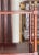 Beautiful chinoiserie faux bamboo shelving unit with brass pinecones onf the top bars. Beautiful mahogany color and...