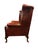 English Chesterfield Wingback Armchair England, mid-20th century Classic English wingback armchair upholstered in deep...