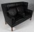 Børge Mogensen new upholstered kupe sofa with black elegance leather. Legs of teak. Model 2292, made by Fredericia...