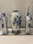 Early 20th Century Delft Set consisting of rounded middle vase with hand painted windmill scene, flanked on both sides by...