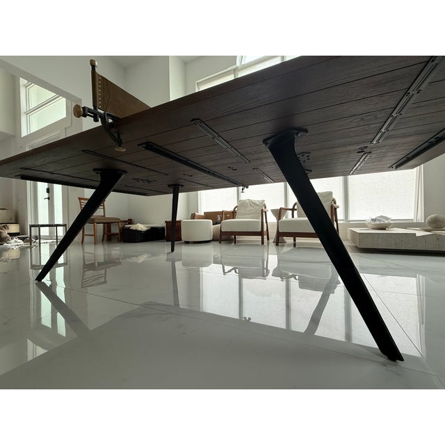 This stylish ping pong table by District Eight is a unique combination of quality materials, modern industrial features...