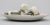 Antique 18th century French tin glaze faience Delft tromp l'oeil plate with sculpture of leeks. The vegetables...