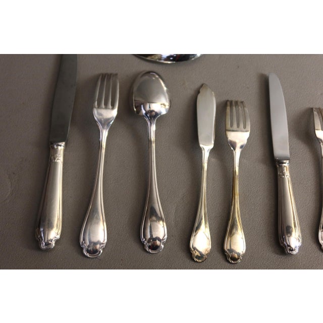A 130-piece silver-plated flatware set in the Pompadour pattern by Christofle. All pieces are stamped "Christofle". It...