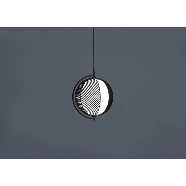 Mondo pendant lamp by Antonio Facco Dimensions: 36.5 x 28 cm (Ø) Floor lamp with movable metal shades with pattern. Mondo...