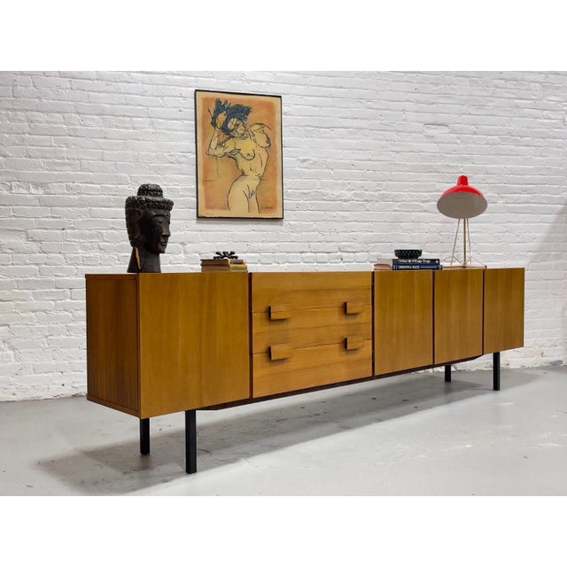 EXTRA LONG and just plain “EXTRA” in every sense. This Mid Century Modern Teak credenza, c. 1960s, is an absolute...