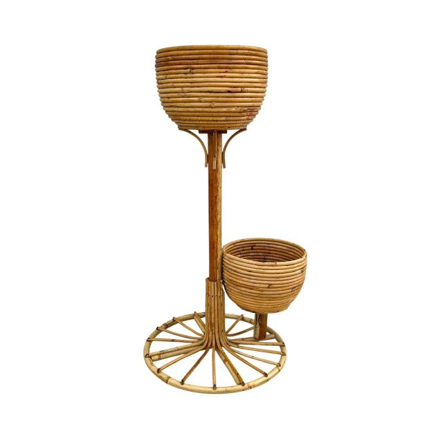 Charming Mid-Century Flower/Plant stand with two baskets on a round base. It it is hand-crafted from organic Rattan-...