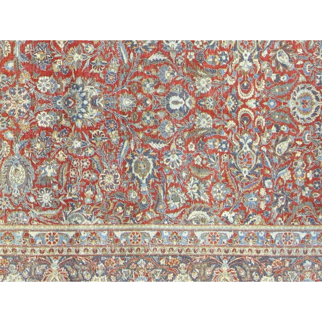 This lavish hand-knotted Persian Tabriz rug adds the perfect touch of elegance to any space. Its intricate design features...