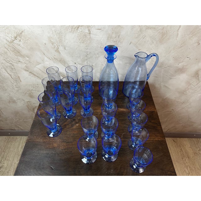 Art Deco Blue Glassware Set – 1930s Complete Set: Flutes, Wine Glasses, Tumblers, Decanter, and Pitcher A superb blue-...
