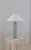 This marble table lamp was produced by bergboms lamp factory in sweden. This one with a rare green marble with exceptional...