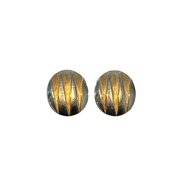 Crown Trifari Vintage Brushed Gold and Silver Tone Domed Clip-On Earrings Elegant and timeless, these vintage Crown...