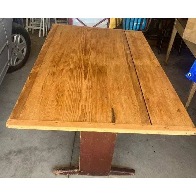 This fantastic all original red painted lift top table with shoe feet and early rose head nails. All original hardware and...