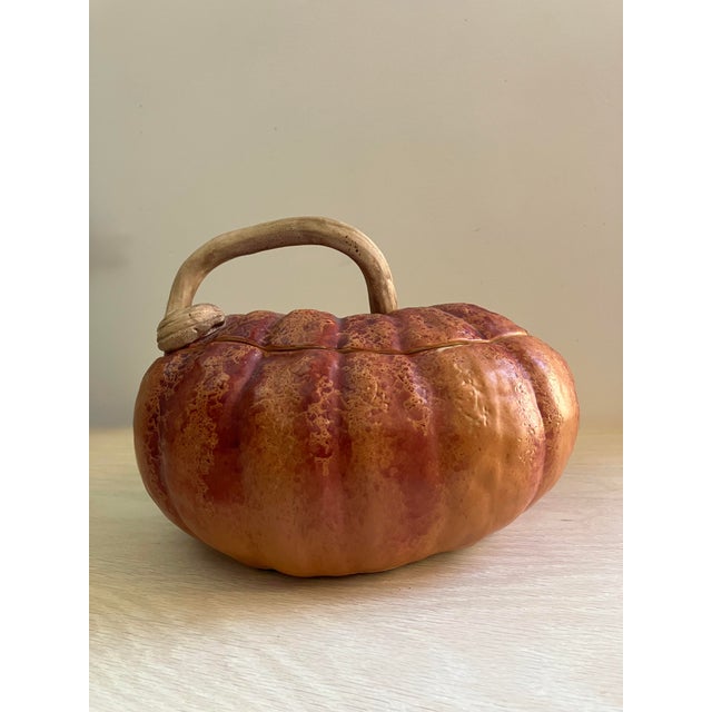 A stunning, large-scale artisan tureen crafted in the Majolica style. The piece features a highly textured, multi-tonal...