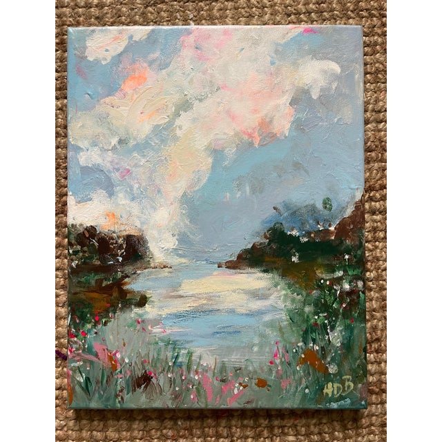 Calm at First Light captures the quiet beauty of a morning shoreline — soft blues, warm whites, and gentle touches of...