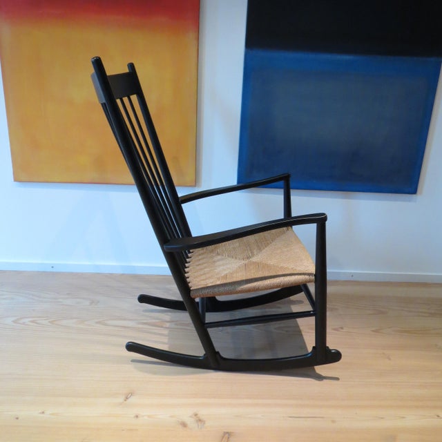 Ebonised rocking chair designed by hans j wegner and manufactured by fdb mobler. originally designed 1944, this chair...