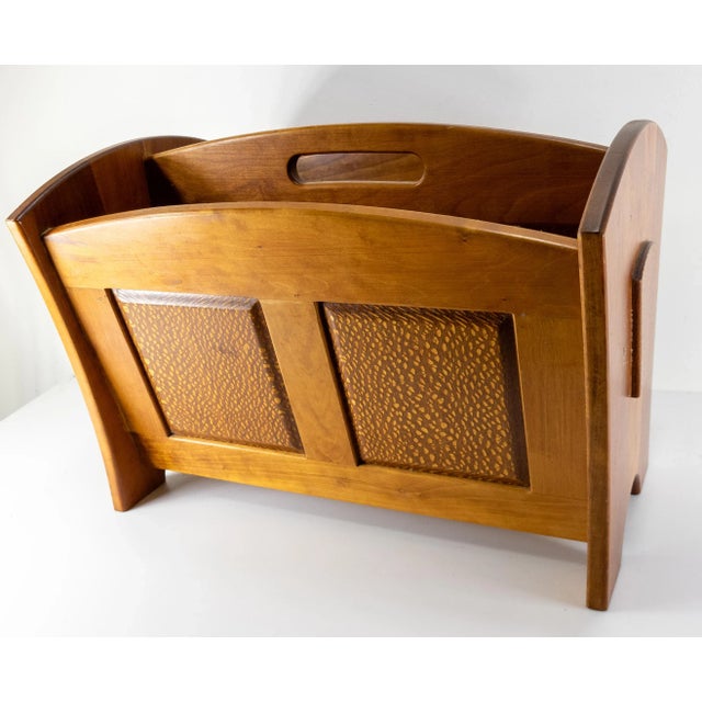 We are selling this stylish handcrafted woodworker made Mid-Century magazine rack that appears to be made from Koa wood....