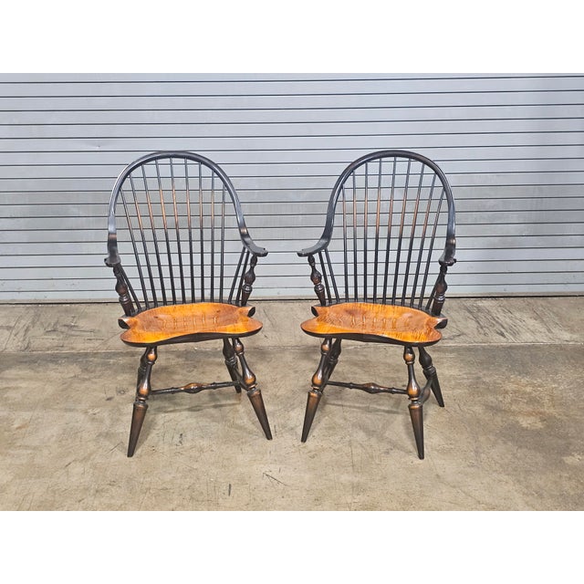 Store Item: Pair of Tiger Maple & Black Continuous Windsor Arm Chairs Bench Made Description: Each Chair has a black...
